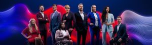 The presenters for Channel Fours Paralympics broadcast stand in front of a blue and red graphic. This includes: de Adepitan,Sophie Morgan, JJ Chalmers, Ed Jackson, Lee McKenzie, Vick Hope , Clare Balding, Arthur Williams, Steph McGovern,