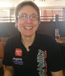 Judith Caulter is pictured smiling wearing glasses